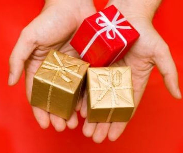 hands giving presents